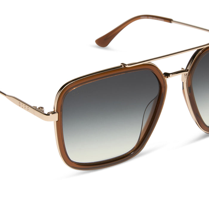 diff eyewear featuring the jordan navigator sunglasses with a whiskey with gold frame and grey gradient lenses detailed view