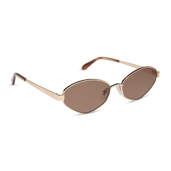 jojo fletcher x diff eyewear jordy cat eye sunglasses with a gold metal frame horn tortoise temples and brown lenses angled view