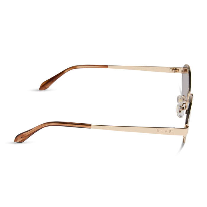 jojo fletcher x diff eyewear jordy cat eye sunglasses with a gold metal frame horn tortoise temples and brown lenses side view