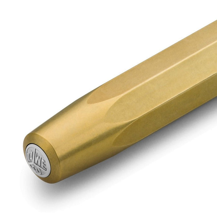 Gold pen with a visible brand logo on a white background