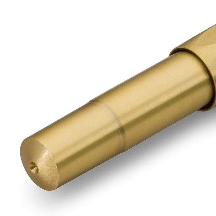 Brass fountain pen close up on white background
