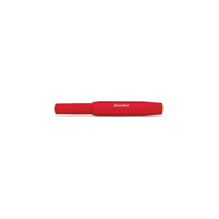 Red fountain pen with cap closed on a white background