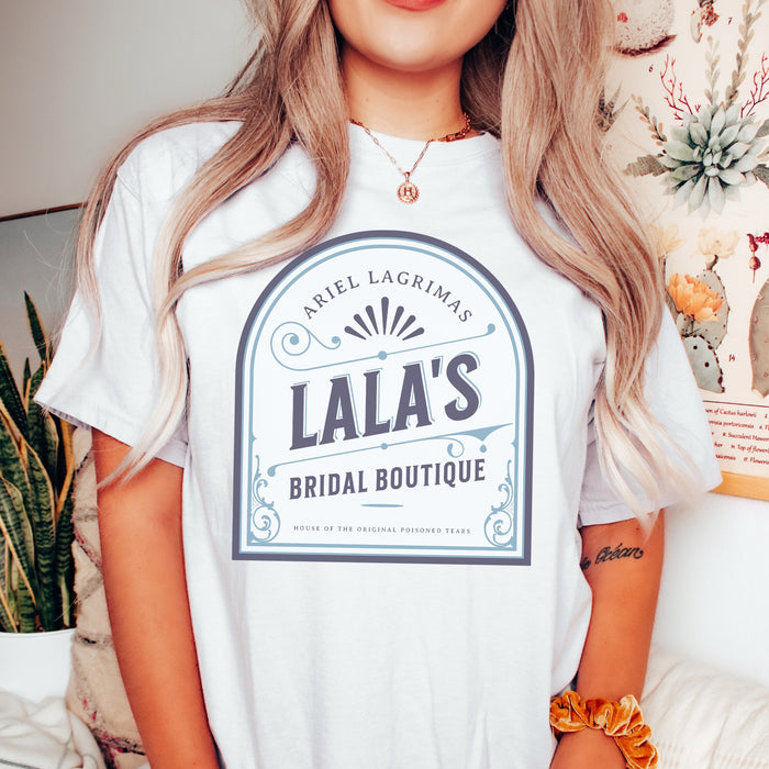 Lala's Bridal Boutique T-Shirt - The Bean Workshop - Arched Crest Badge, Blue and Cream Color Palette, Book Club Outfit, Everyday Bookish Style, Lalas Bridal Boutique T-Shirt for Book Lovers, Once Upon a Broken Heart, Stephanie Garber, Storybook Boutique, T-Shirt, The Unwed Bride Fan Gift, Vintage Bridal, Vintage Flourish Typography