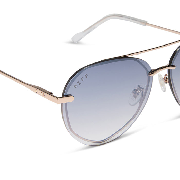 diff eyewear featuring the lenox xs aviator sunglasses with a champagne gold (light gold) frame and blue slate gradient with silver flash lenses detailed view
