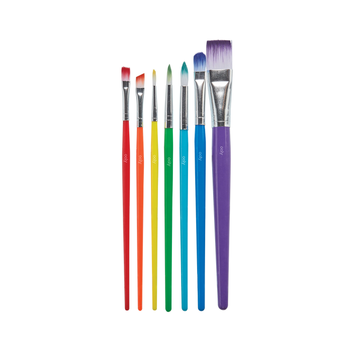 Row of paint brushes in rainbow order from OOLY Lil Paint Brush Set