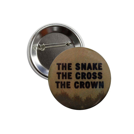 A round pin-back button featuring The Snake The Cross The Crown’s bold black logo on a brown background. Displayed front and back on white, this accessory showcases the distinctive Logo Brown design from the band’s official brand.
