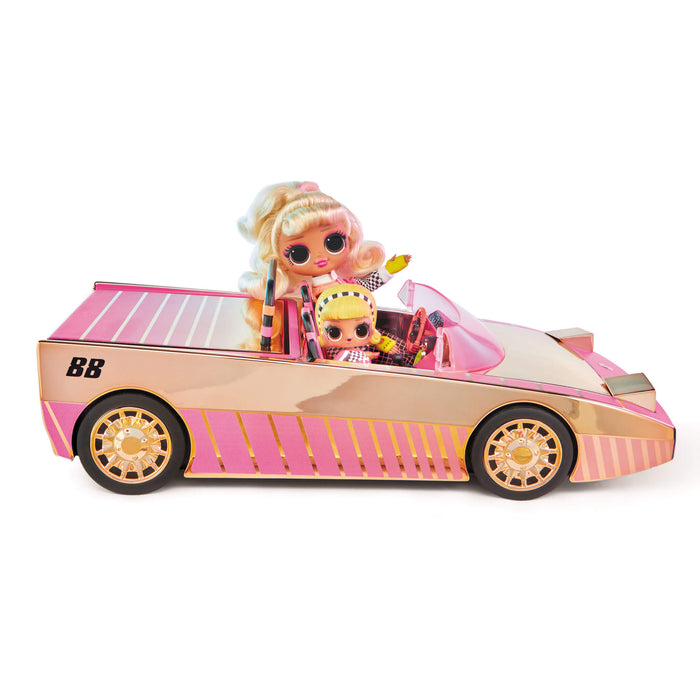 Doll and tot sitting in the car on a white background