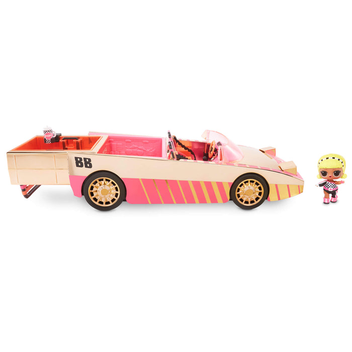 Toy car with pink interior and 'BB' branding, accompanied by a small doll on a white background