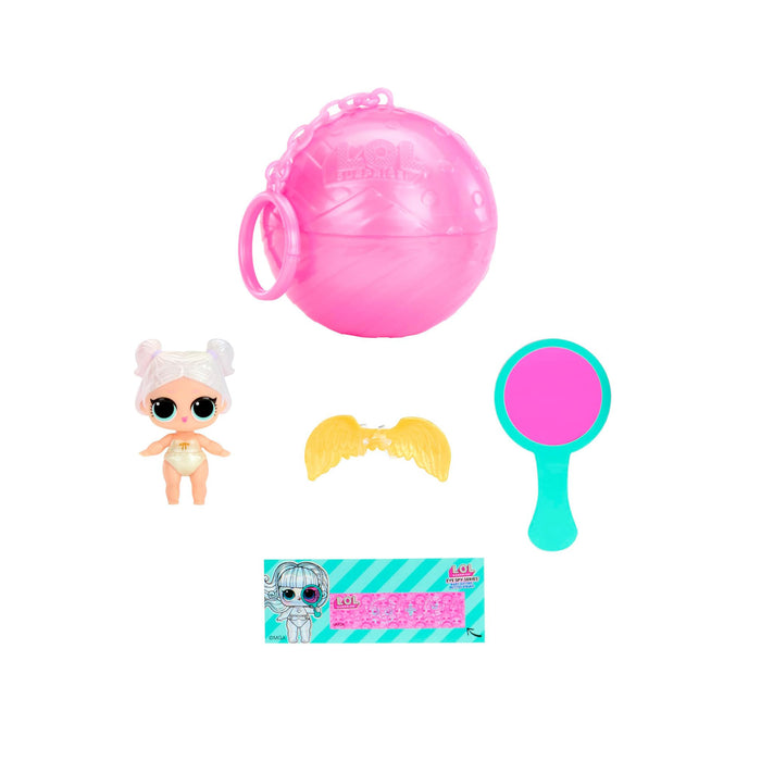 Set of toys including a pink ball, small doll, wings, and a mirror on a white background.