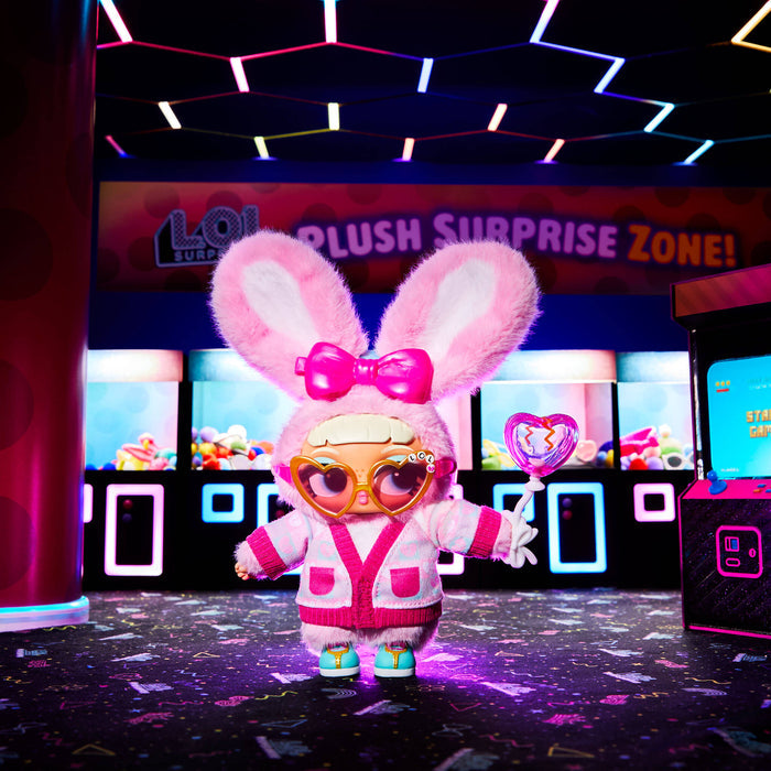 Toy figure in a pink bunny outfit with sunglasses in a colorful indoor setting