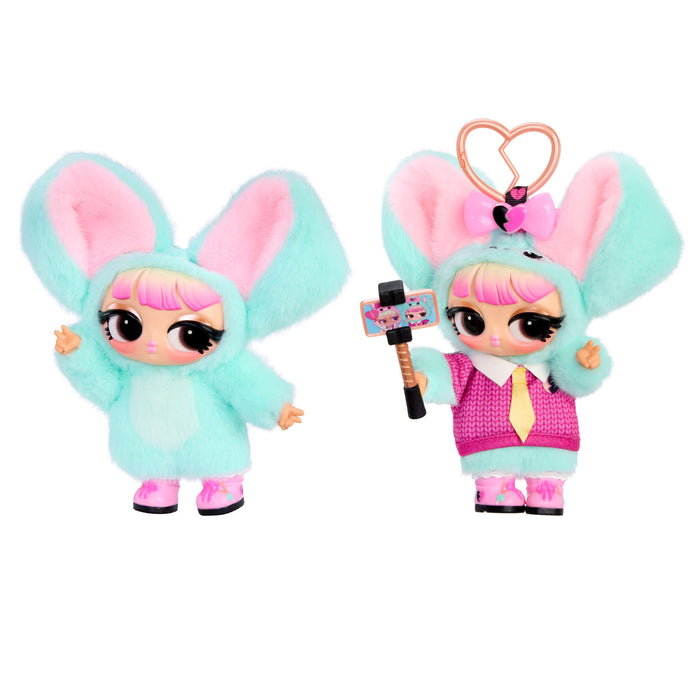 Two plush toys with blue fur and brown skin, one holding a microphone, on a white background.