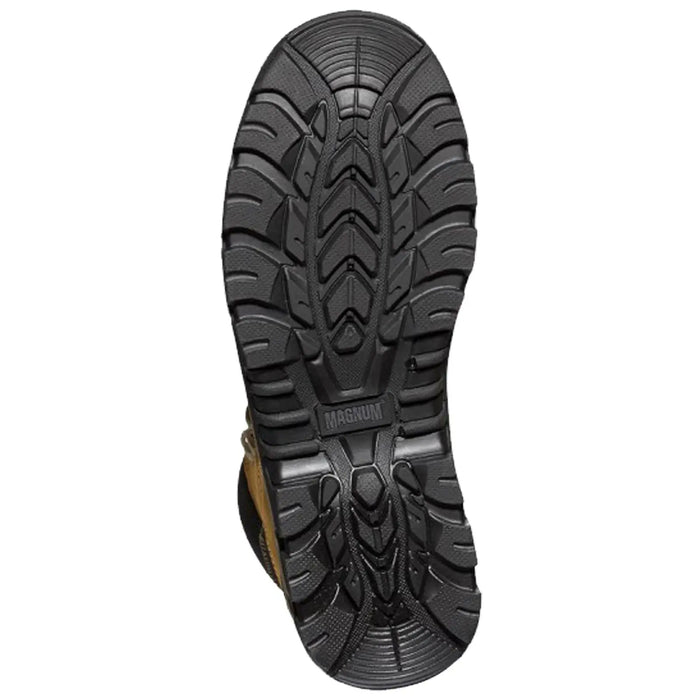 A rugged black boot sole with deep treads is positioned for viewing displaying the brand MAGNUM indicating its intended use for outdoor or heavy-duty activities in varied terrains.