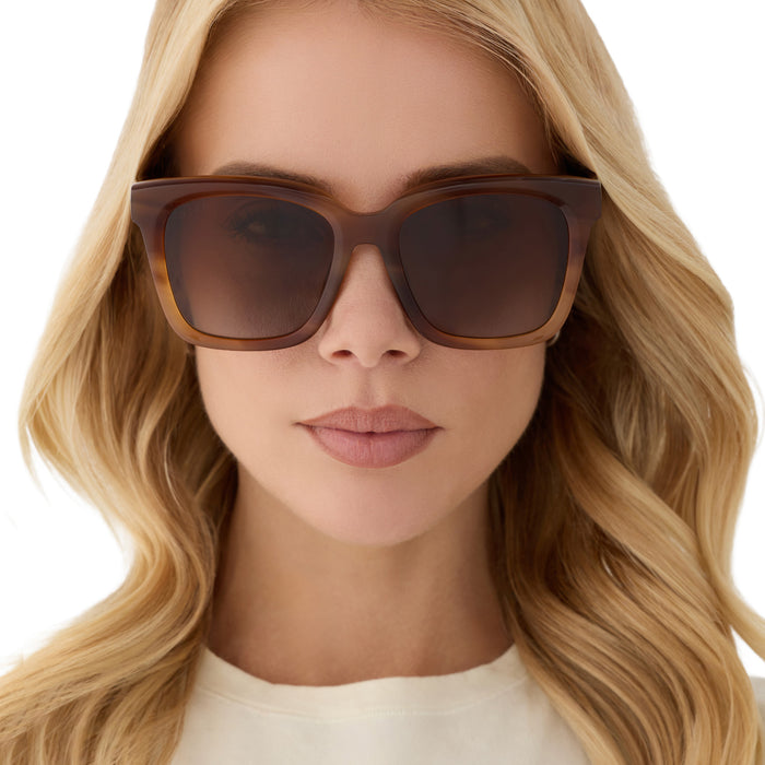 on model - blonde female wearing diff eyewear featuring the meredith square sunglasses with a tawny brown tortoise frame and brown gradient polarized lenses front view