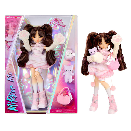 Mirror Mi Akiko Kittyama doll shown both inside its pink and holographic retail packaging on the left, and as a loose figure on the right against a plain white background. The doll has long dark brown pigtails, wears a light pink dress and matching boots, holds a small pink plush, and has a pink purse accessory visible in the package.