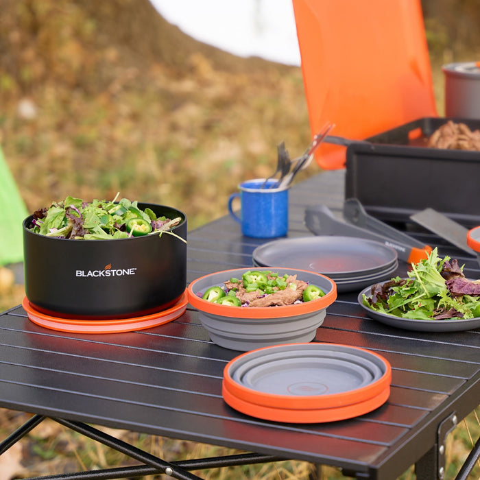 The collapsible bowls are perfect for stir fry in the backwoods and the big bowl is perfect for mixing and holding salad or food prep.