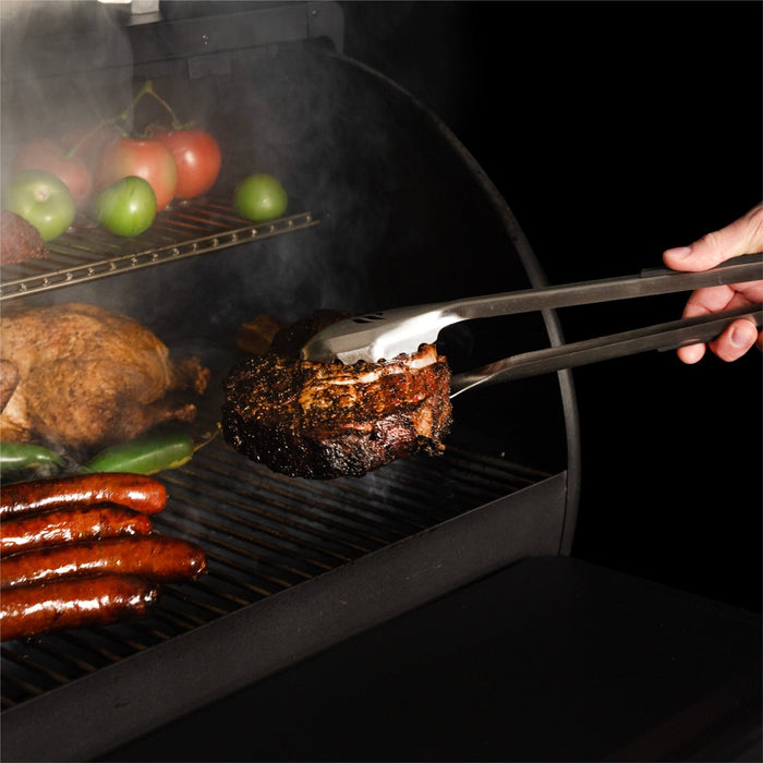 The grill tongs include extra grip for removing cuts of meat from the grill.