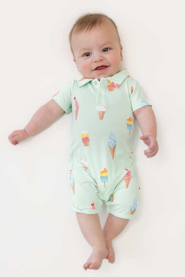 Baby wearing Polo Shortall in Mint Ice cream print on a beige background