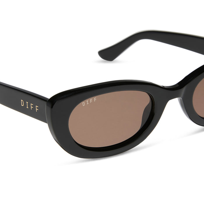 jojo fletcher x diff eyewear jordy round cat eye sunglasses with a black acetate frame and brown lenses detailed view