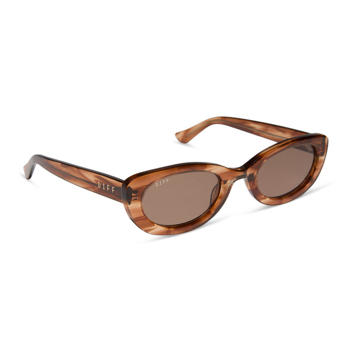 jojo fletcher x diff eyewear jordy round cat eye sunglasses with a horn tortoise acetate frame and brown lenses angled view