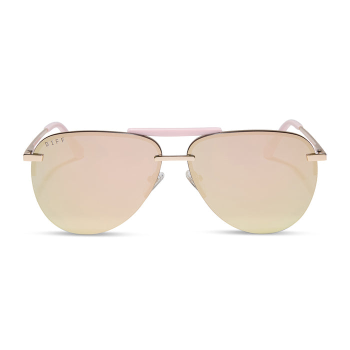 diff eyewear featuring the tahoe aviator sunglasses with a gold with powder pink brow bar & temple tips frame and taupe mirror lenses front view