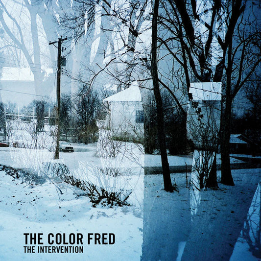 Album cover for The Intervention by The Color Fred shows a snowy, leafless suburban scene with bare trees, power lines, and houses, overlaid with a blue abstract double-exposure effect. Text is placed in the bottom left corner.