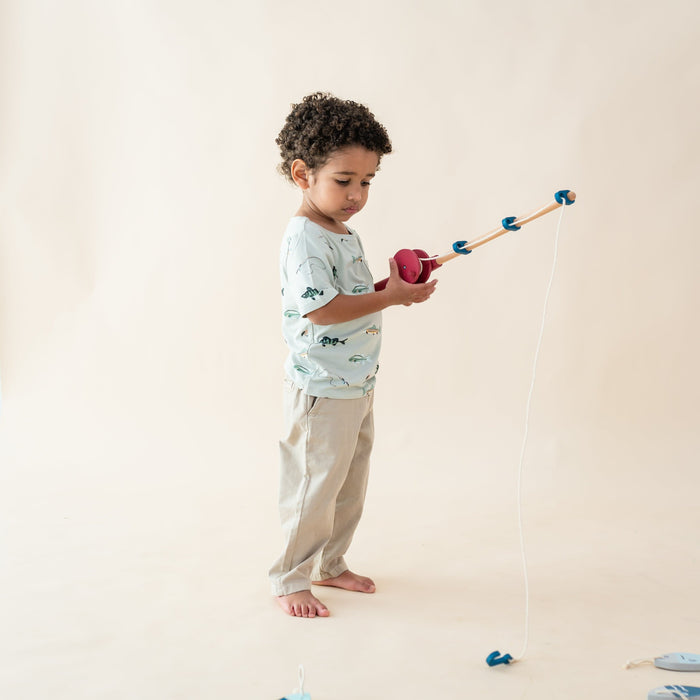 Child wearing Kyte Baby Toddler Crew Neck Tee with chest pocket in Fishing
