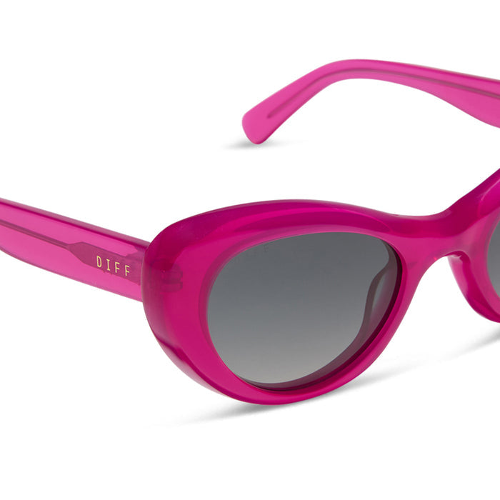 diff eyewear featuring the zaria cat eye sunglasses with a bright tulip pink frame and grey gradient polarized lenses detailed view