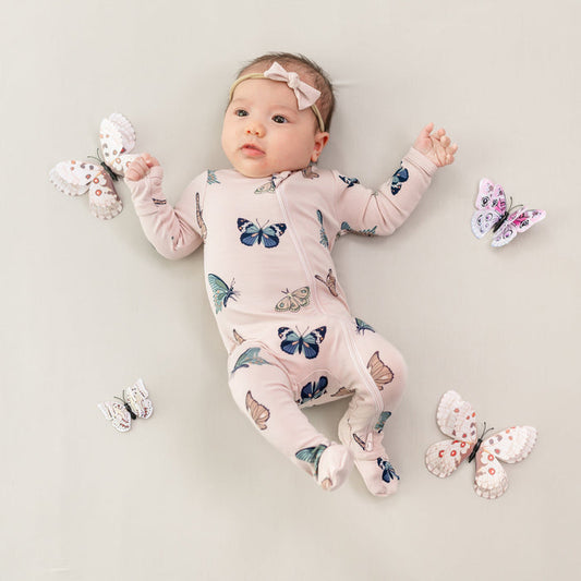 Infant wearing Zippered Footie in Blush Butterfly