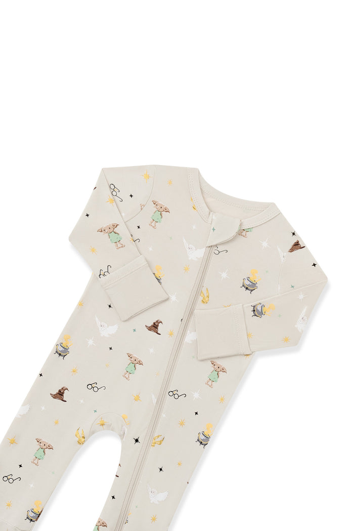 Top part of Beige Harry Potter patterned Zippered Romper on a white background